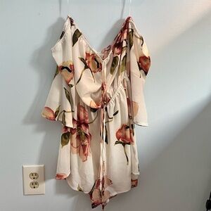 Off the shoulder floral romper with 3/4 bell sleeves in size medium